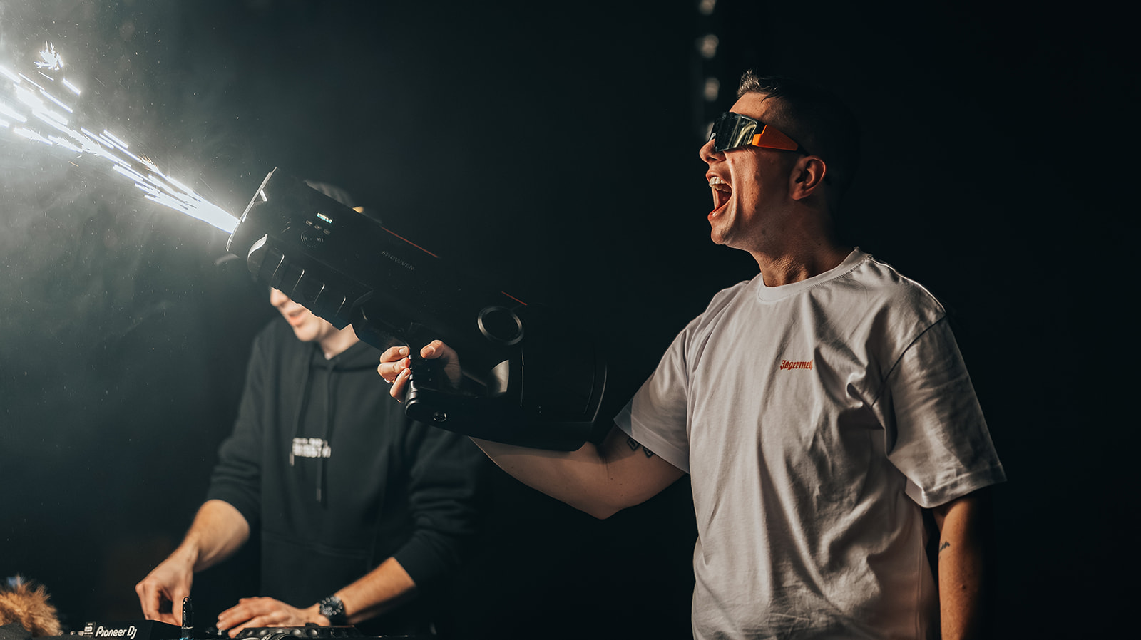 Artist screaming while firing a confetti cannon on stage — Best of, photographed by Paul Rumplmaier