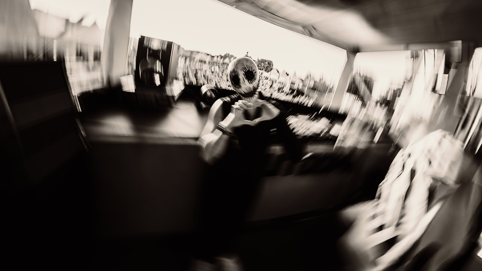 Motion blurred black and white frame of a brass player — Shutdown Festival, photographed by Paul Rumplmaier